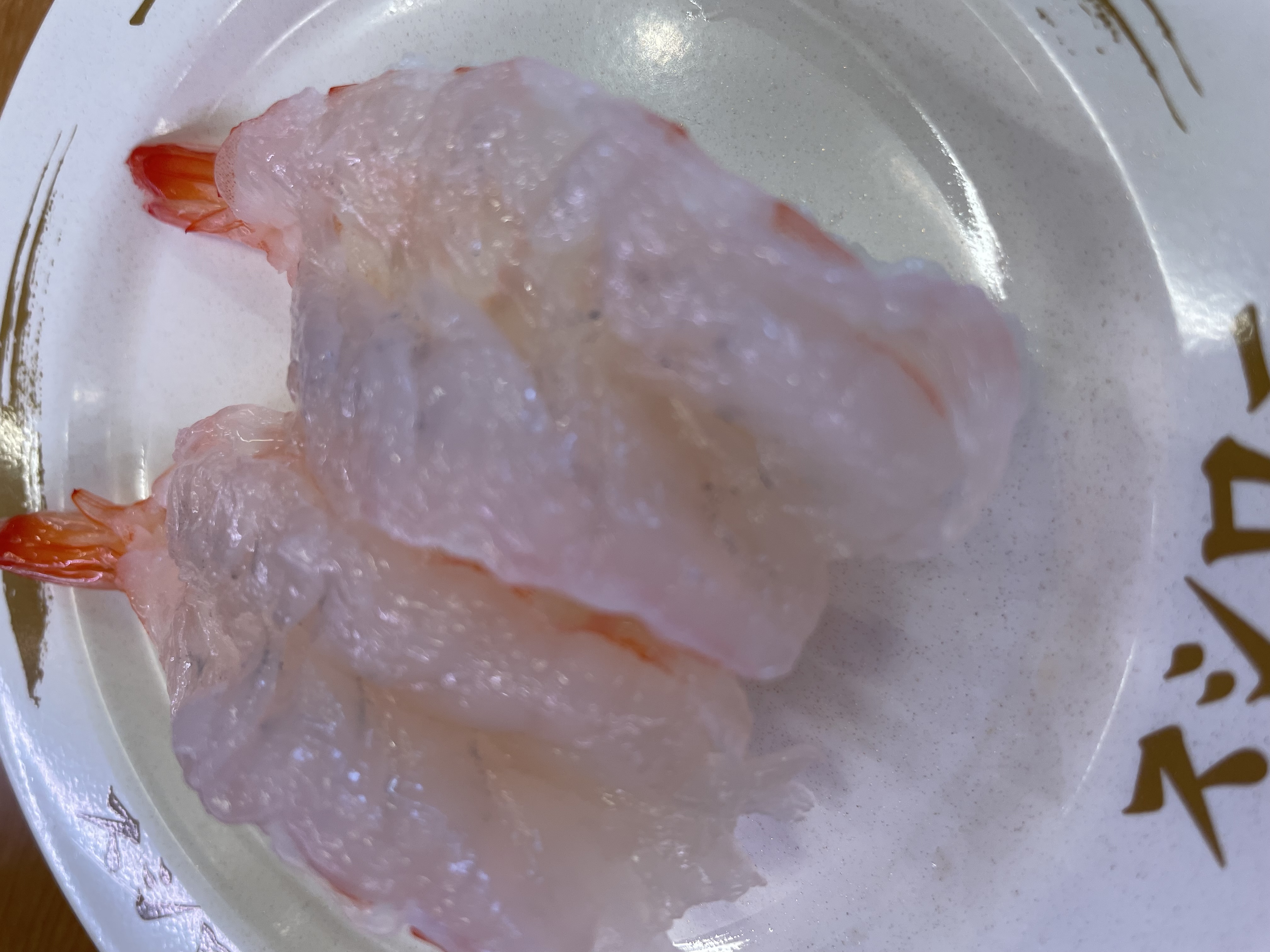 回転寿司の画像